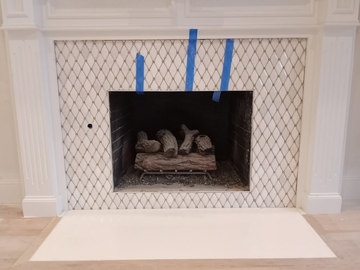 Diamond-pattern tile fireplace surround