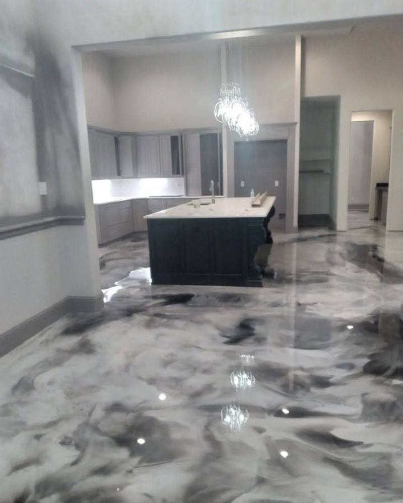 Metallic white and grey epoxy resin floor in an open kitchen