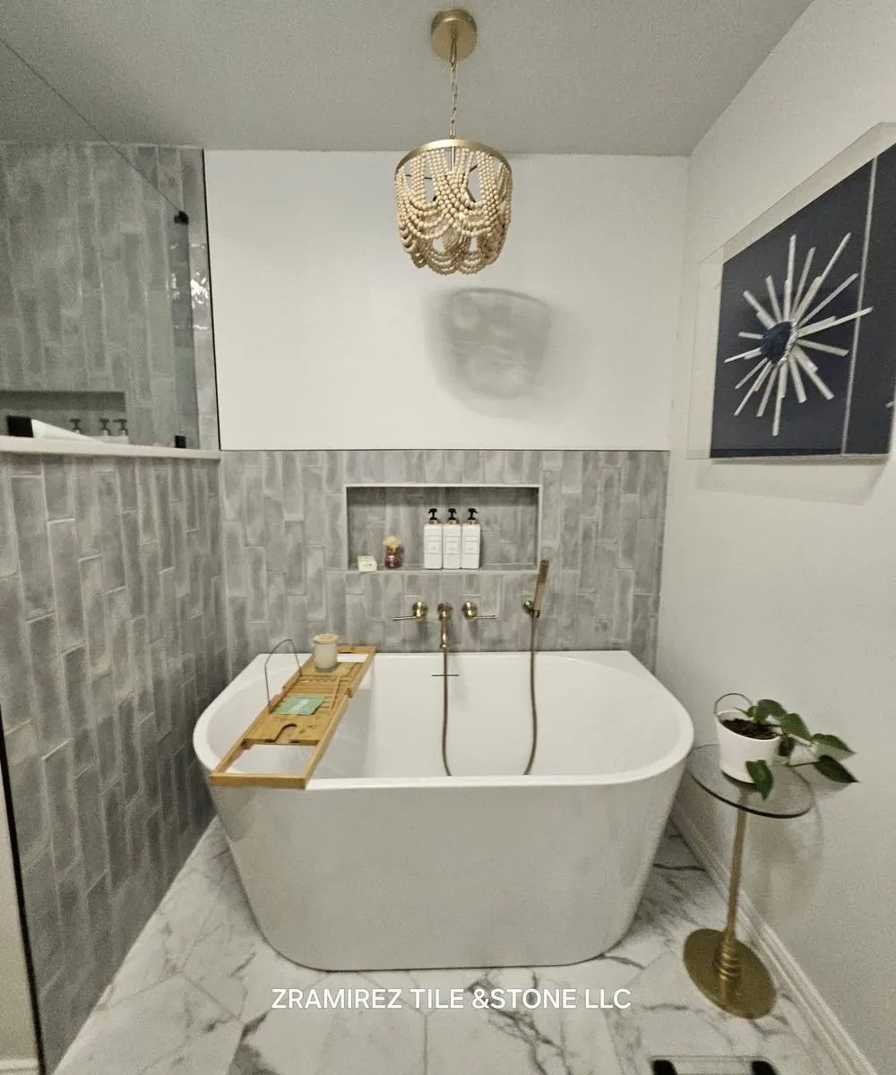 Freestanding tub with tiled feature wall