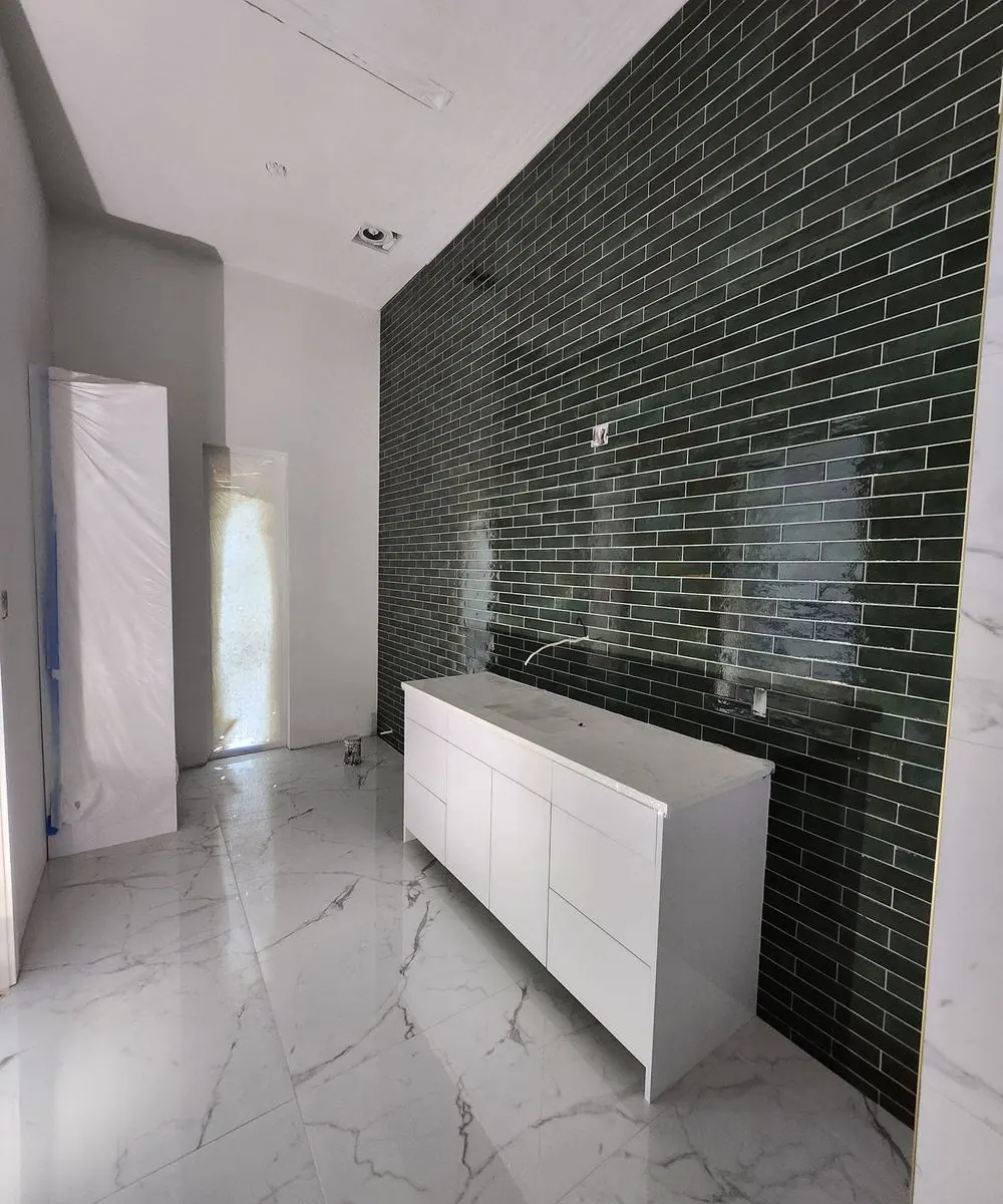 Green glass tile feature wall