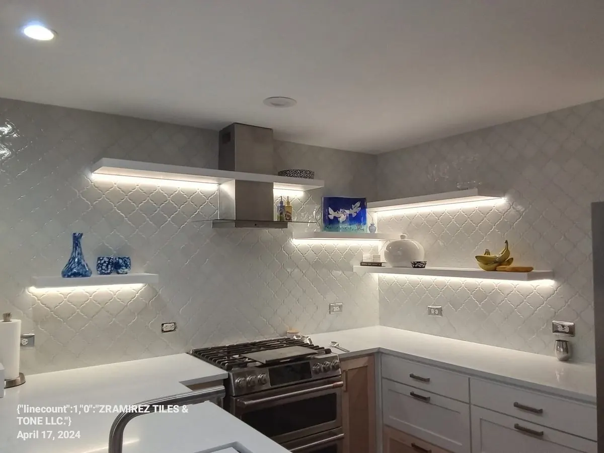 Kitchen backsplash with lit open shelving