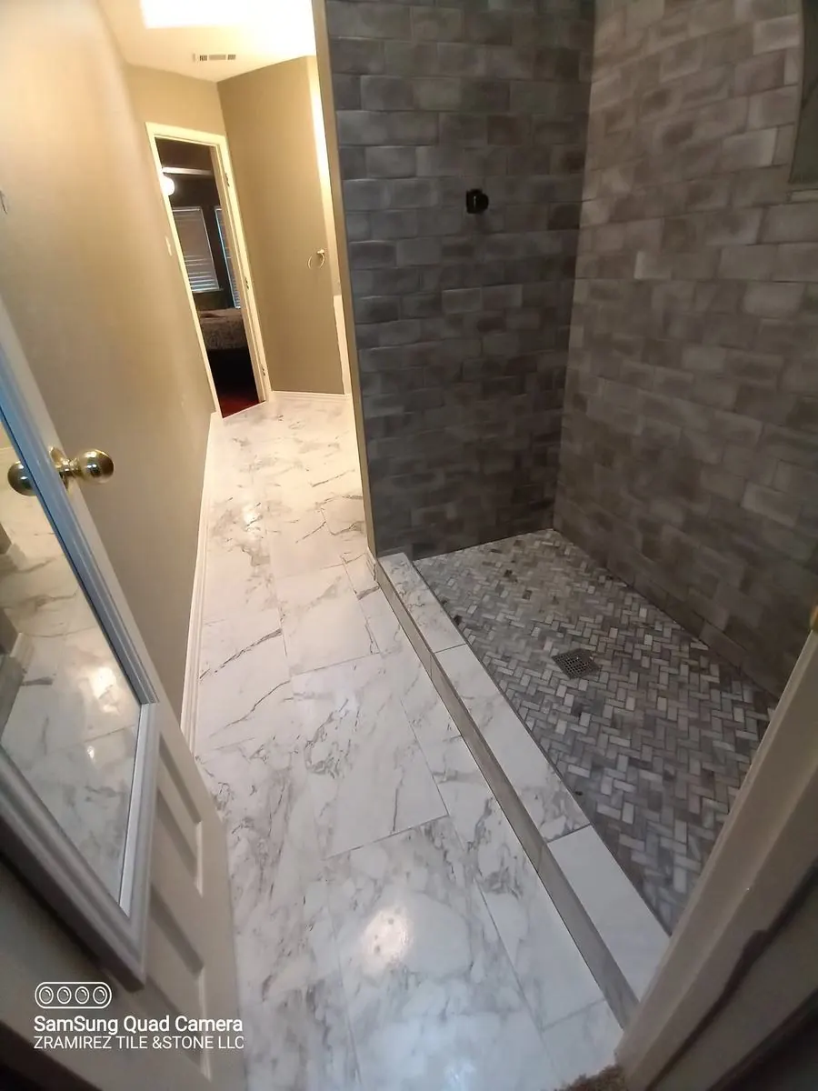 Marble-look bathroom with walk-in shower