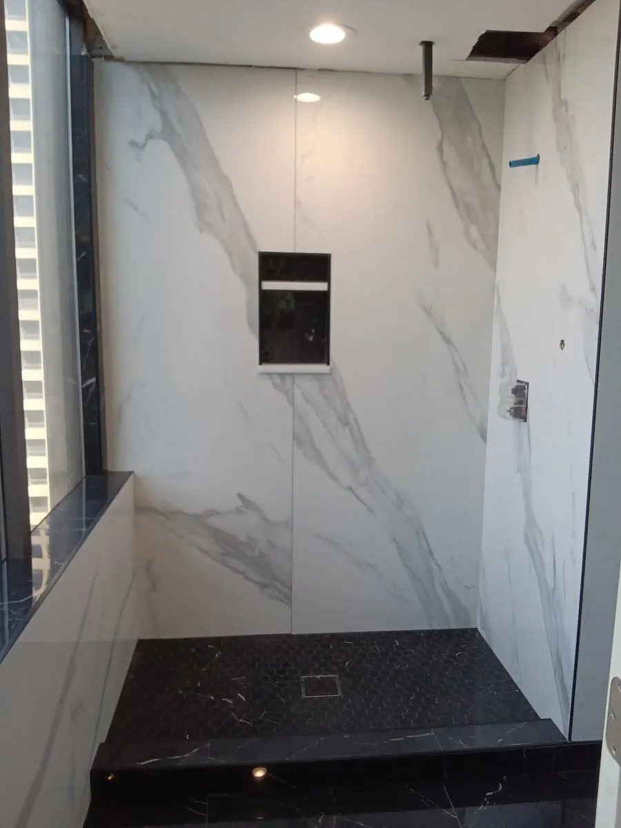 Marble-look walk-in shower