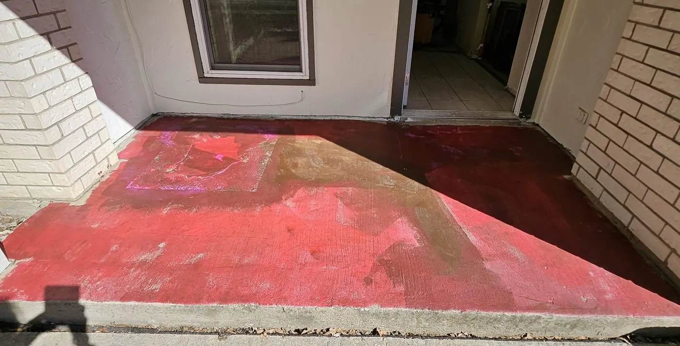 Before: Stained concrete porch