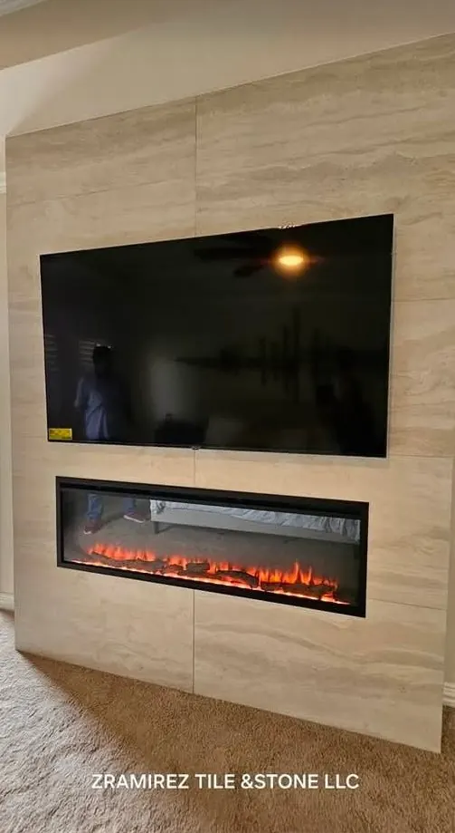 Travertine-look porcelain TV and fireplace wall